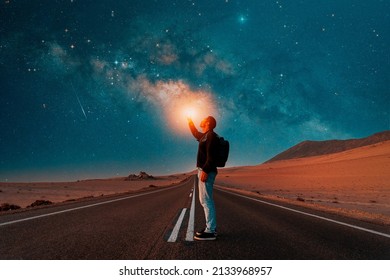 Person On The Road Under The Milky Way At Night