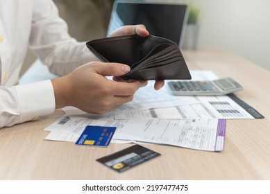 Person Open An Empty Wallet On The Table