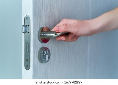 Person Opens The Door. Hand On Door Handle