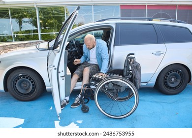 A person with paraplegia showing independence, transferring from a vehicle to his wheelchair in an accessible parking space. - Powered by Shutterstock