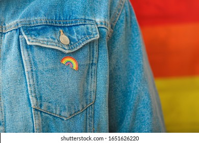 Person With Pinned Rainbow Badge As A Symbol Of LGBT, Closeup