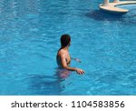 A person in a pool.