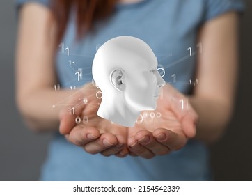 A Person Presenting A 3D Rendered Human Head With A Network Plexus Structure