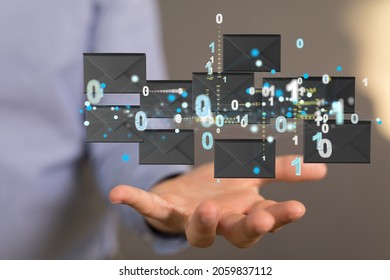 A person presenting the virtual projection of electronic mail icons with binary codes