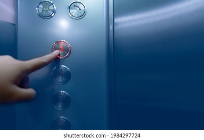 Person Pressing On The Fifth Floor Of Elevator Button. Hand Press Number 5 On Button Inside Office Or Hotel Lift. Index Finger Press On Lift Button. Claustrophobia. People Stuck In Lift. Braille Code.