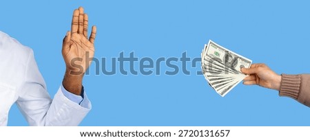 Person Refusing Money While Another Offers Cash in a Neutral Setting