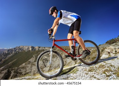 Person riding a bike downhill style