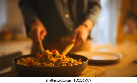 Person Serving Delicious Looking Pasta On The Plate. Serving Profesionally Cooked Pasta Dish In The Restaurant Or For Romantic Dinner Meal At Home. Close-up Shot