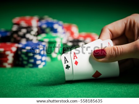 Person showing her deck at the poker game