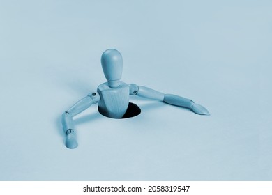 Person Sinking In Or Getting Out Of A Hole, Abstract Concept