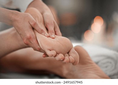 Person, spa and masseuse for foot massage, pedicure therapy and pamper muscle for detox. Therapist, client and reflexology at hotel for circulation, treatment and acupressure for healing service - Powered by Shutterstock