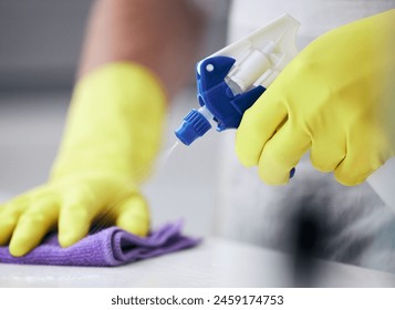 Person, spray and bottle for cleaning surface of dirt or dust in home for health and hygiene and maintenance. Hands, chemical detergent and housekeeping or housework for disinfection or sanitize. - Powered by Shutterstock