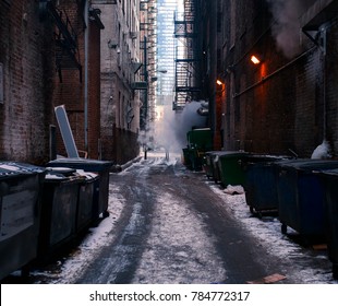 A person stands ate end of an alley where smoke is filling the background of the photo,