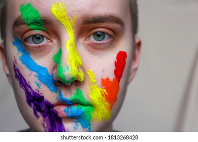 Person Staring With Rainbow Face Paint