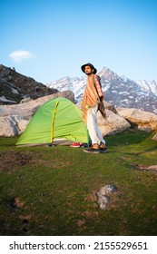 Person with a tent in Triund Trek Top, Himachal Pradesh, India.