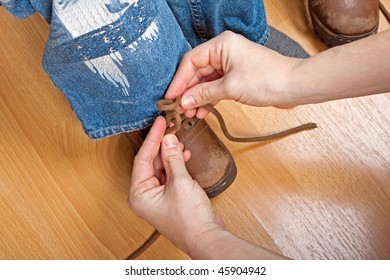 Person Tying Little Child Boy Foot Sport Shoe Lace