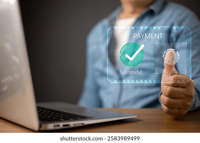 A person uses a biometric fingerprint scan for an online payment on a laptop.futuristic digital interface displays PAYMENT Successful with a green checkmark, symbol secure transactions.