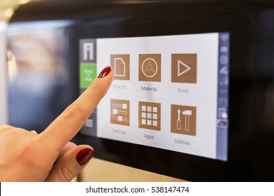 Person Using 3D Printers Touch Screen