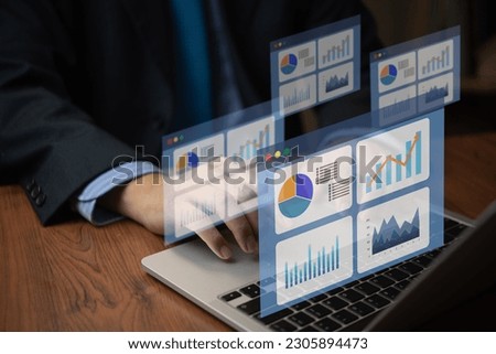 person using computer big data analysis dashboard on virtual screen. Business graph and chart report financial and information marketing plan strategy success concept.
