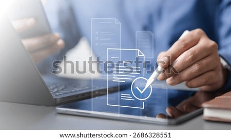 Person using digital tablet with document icons, representing tax receipts, accounting records, finance organization, digital filing, and bookkeeping for efficient financial management and compliance.