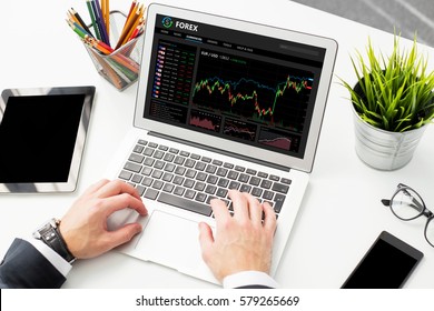 Person using Forex trading software - Shutterstock ID 579265669