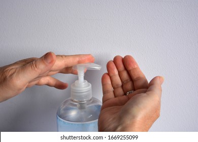 Person Using Hand Sanitiser, Close Up