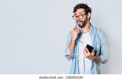 Person using handsfree on a cellphone call isolated, People on a call using handsfree. handsome man using handsfree while calling on cellphone