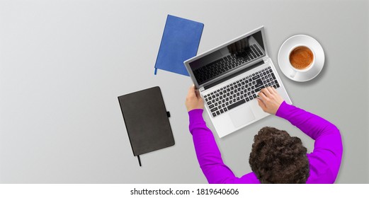 Person using a laptop computer on the work place