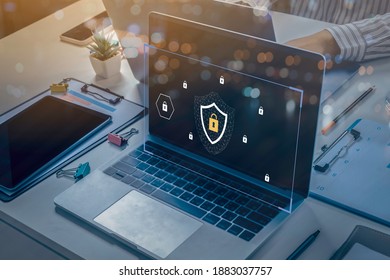 Person using a laptop computer with technology cybersecurity and privacy concept. protection and safe data for global network security.