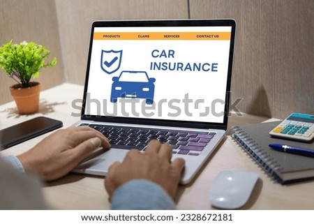 person using a laptop device to access an online car insurance platform customers can compare quotes, With this innovative solution, file claims, and access roadside assistance right.