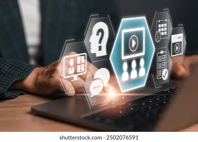 A person using a laptop with digital icons representing a webinar, online learning, and virtual meetings. Ideal for business, education, and technology themes. - Powered by Shutterstock