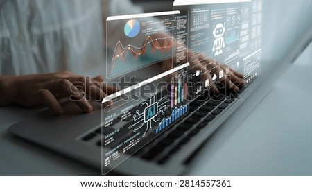 Person Using Laptop with Digital Interface Displaying Data Graphs, AI Elements, and Analytical Charts for Technology and Innovation Insights