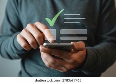 Person using a smartphone to complete a digital form with a checkmark confirmation