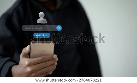 Person using smartphone for digital identity verification with national ID authentication interface, secure online examination and personal data validation technology concept.