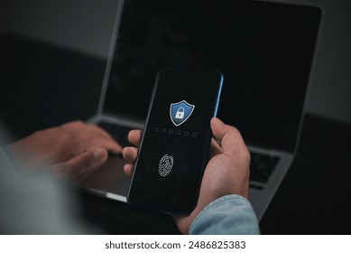 Person using smartphone with fingerprint authentication, ensuring digital security. Modern mobile technology for identity verification, data protection. Privacy, internet safety. - Powered by Shutterstock - Get 15% off with code: PIKWIZARD15