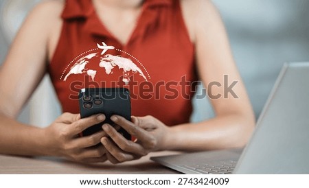 Person using smartphone with global map and airplane icon overlay, representing online travel booking, international travel planning, global connectivity, digital communication and worldwide business concept.