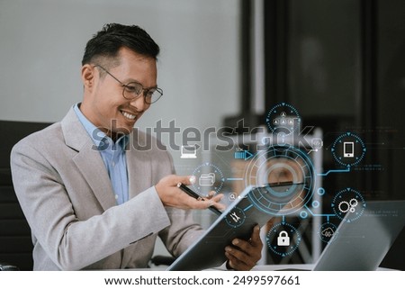 Person using smartphone, tablet with SDK icon on virtual screen. SDK Software development kit programming language technology concept in office.