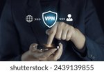 Person using smartphone with VPN icon on virtual screen for connect to VPN network.safe and secure internet access on mobile phone.VPN, Virtual private network protocol concept.