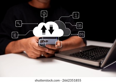 A person is using a smartphone while interacting with cloud technology, represented by icons for data transfer and various applications.