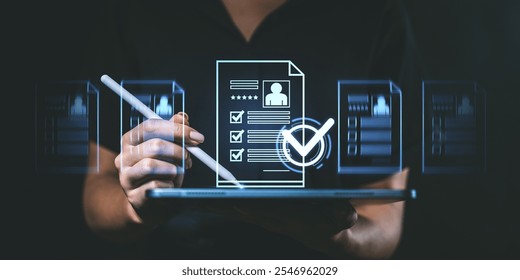 Person using a stylus on a tablet to interact with holographic resume documents. Dark background. Concept of digital job application process