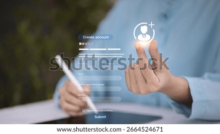 Person using stylus and touchscreen to create online account with digital registration form, concept of sign up and user profile creation.