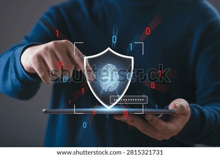 Person using tablet with digital shield and biometric fingerprint scan, representing cybersecurity, data protection, identity verification, secure authentication, privacy technology, and cyber defense