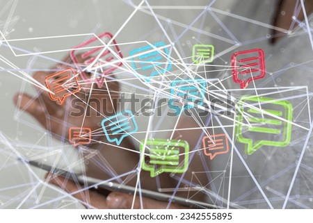 A person using their phone with lots of other icons in the foreground