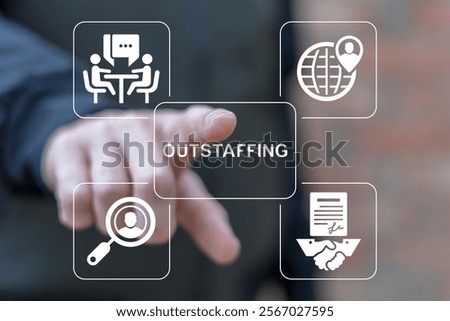 Person using virtual touch screen push word: OUTSTAFFING. Outstaffing business concept for recruitment solution consulting management solving onboarding. Outsourcing or Subcontract Workers Attraction.