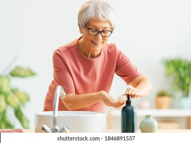 Person is washing hands with soap. Protection against coronavirus. Prevention, hygiene to stop spreading virus. - Powered by Shutterstock