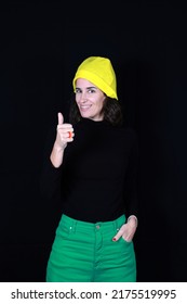 Person Wearing Yellow Hat And Showing His Thumb Up