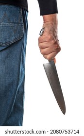 Person wears blue jeans hairy skin chef holding kitchen knife by hand white background