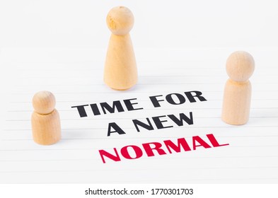 Person wooden doll standing with Time for a New normal. Life after pandemic concept. - Shutterstock ID 1770301703