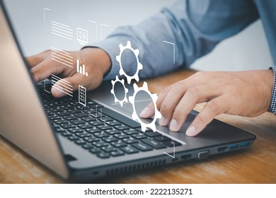 Person working on computer laptop. automation, industrial business process workflow optimisation concept on virtual digital screen. Automation Software Technology Process System Business concept.