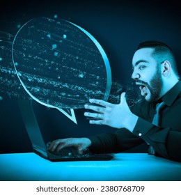 person working with very sharp face with laptop and delivering a speech in blue tones and lights